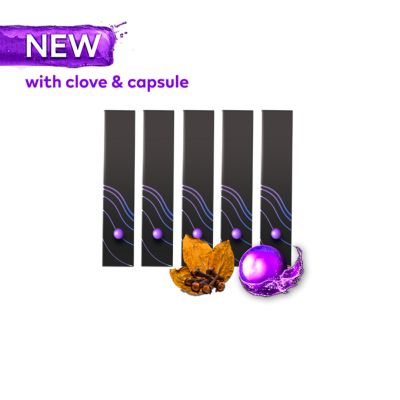 Warranty cards IQOS ILUMA i  – close-up of holder on top of pocket charger with a blue background