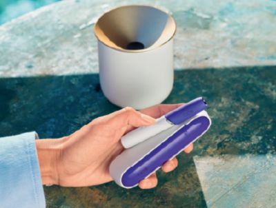 An IQOS device on a table.