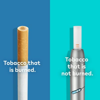 IQOS Originals DUO holder, next to a cigarette