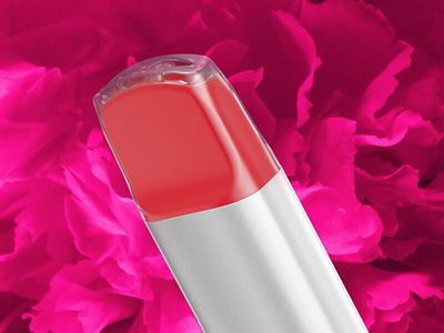 Close up of the VEEV NOW watermelon vape mouthpiece with patterned pink background