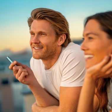 Woman receiving an IQOS delivery