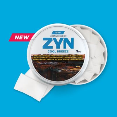 ZYN COOL MINT - an open, light blue nicotine pouch can