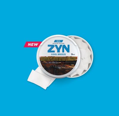 ZYN COOL MINT - an open, light blue nicotine pouch can