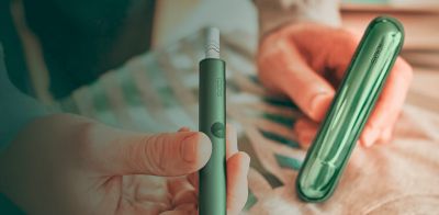 Moss green IQOS ILUMA device