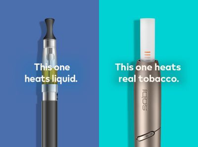 Burnt sausage on a fork compared to a clean IQOS HEETS stick in IQOS 3 DUO holder.