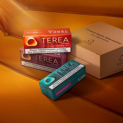 Drei Stangen TEREA neben einem Paket