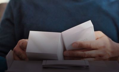 A man with an IQOS box.