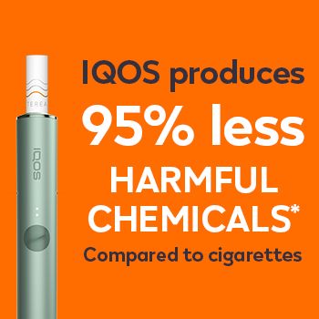 Cigarette filter with brown combustion stains compared to IQOS TEREA stick in an IQOS ILUMA holder with no equivalent stain.