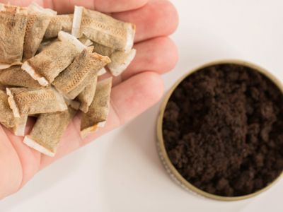 A small pile of white nicotine pouches.