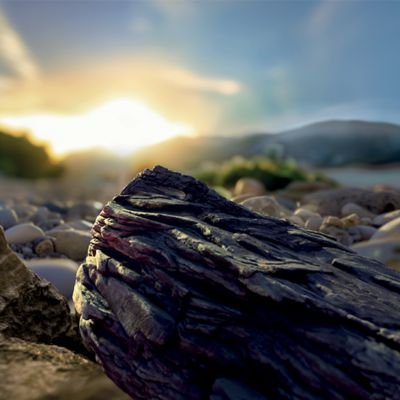 Krabička TEREA Silver na pozadí krajiny při západu slunce